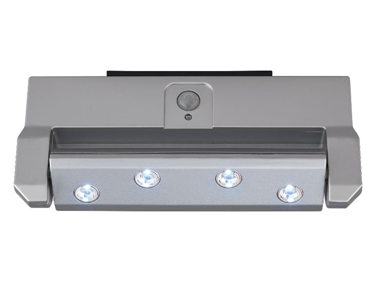 Zilveren lamp met bewegingssensor en vier LED-lampjes.