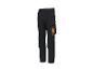Pantalon de travail noir Parkside avec détails et poches orange.