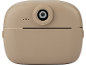 Appareil photo instantané beige avec objectif et ouvertures de haut-parleur.