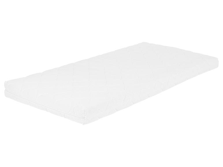 Een witte matras met een gestikte diamantpatroon.