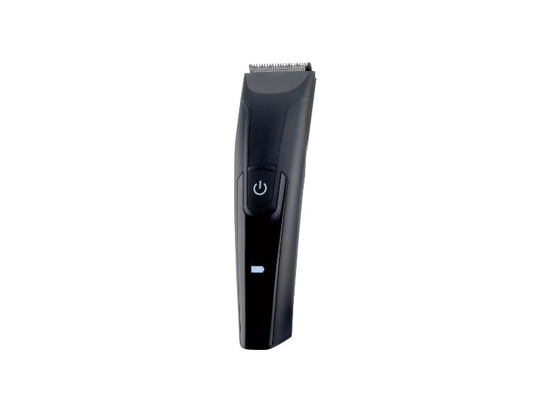 Zwarte tondeuse met aan/uit-knop en batterij-indicator.