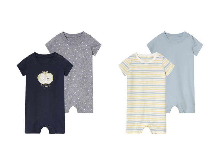 Baby rompers met sterren, strepen en een appelprint.