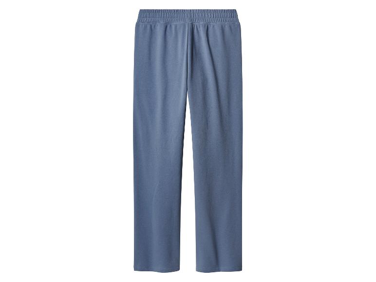 Blauwe, losvallende trainingsbroek met elastische tailleband.