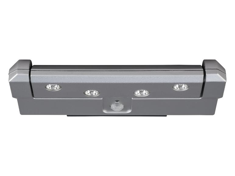 Zilveren lamp met bewegingssensor en drie LED-lampjes.