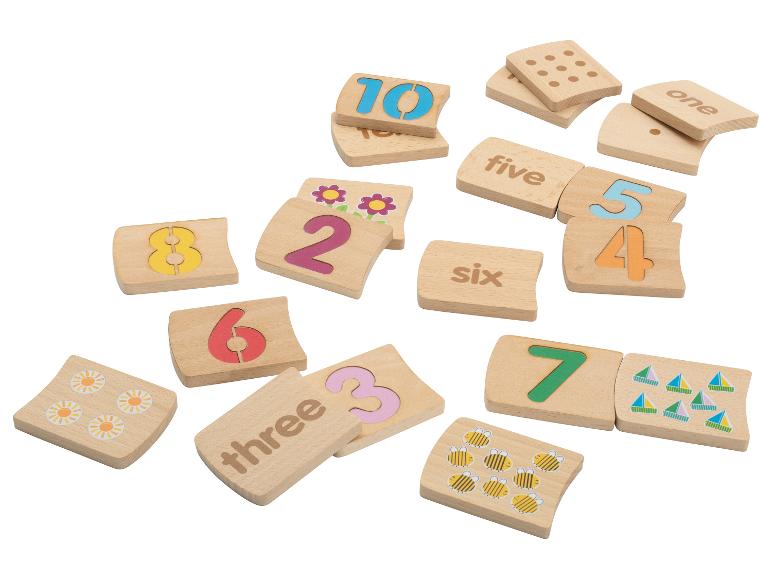 Puzzle en bois avec chiffres et images pour apprendre à compter.