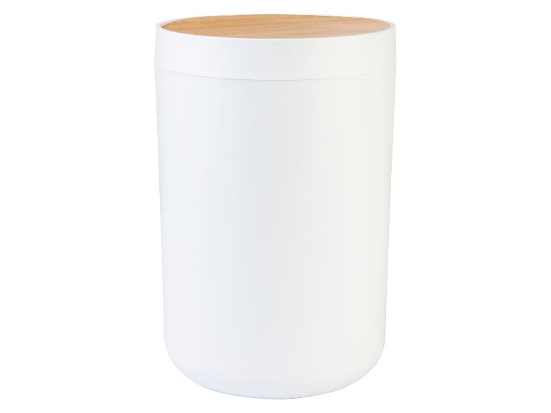 Witte cilindrische container met een licht houten deksel