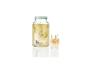 Drinkdispenser met kraan en glas, verfrissende limonade.