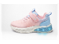 Roze kindersneakers met oplichtende zolen.