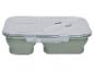 Groene opvouwbare lunchbox met transparant deksel en ingebouwd bestek.
