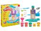 Ensemble de jeu Play-Doh Rainbow Swirl Ice Cream avec machine, accessoires et 5 pots de pâte à modeler.