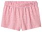 Short rose à pois blancs avec taille élastiquée.