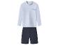 Kinderzwemset met een wit shirt met lange mouwen met blauwe golf en een donkerblauwe korte broek.
