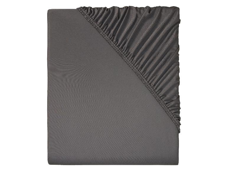 Drap-housse gris foncé, tissu extensible.