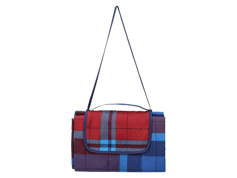 Couverture de pique-nique pliable à carreaux rouges et bleus avec bandoulière.