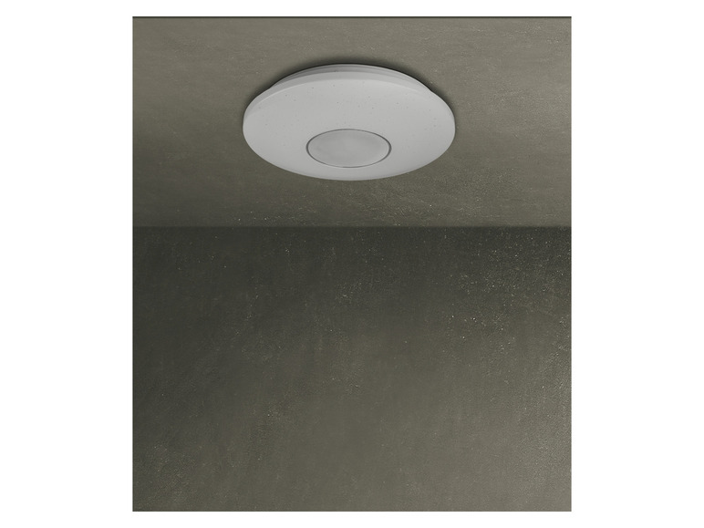 Un luminaire de plafond blanc avec haut-parleur intégré.