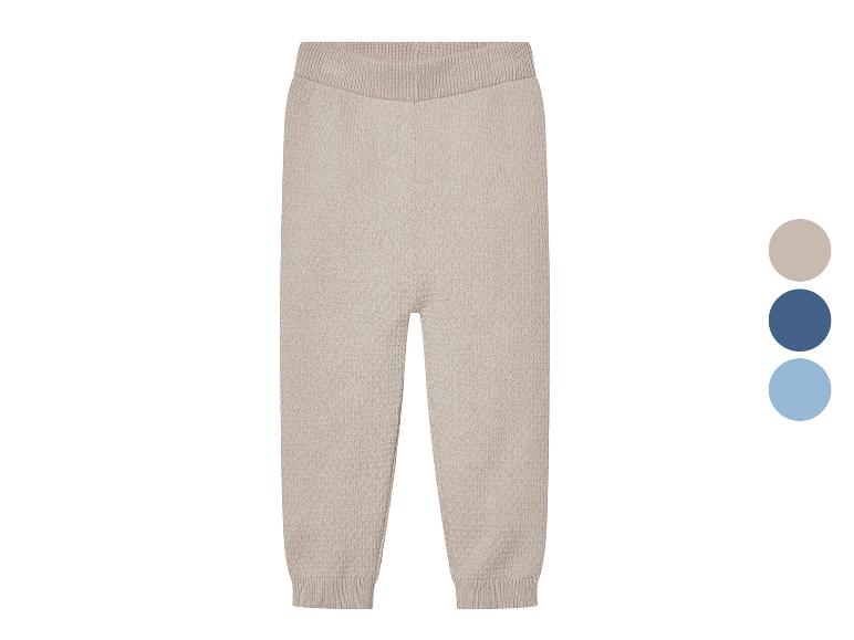 Pantalon en maille beige à motif losange.