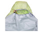 Un sac de couchage vert avec une capuche et l'étiquette 'Tambu Tongi 750X'.