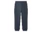 Pantalon de survêtement bleu foncé simple avec taille et chevilles élastiques.