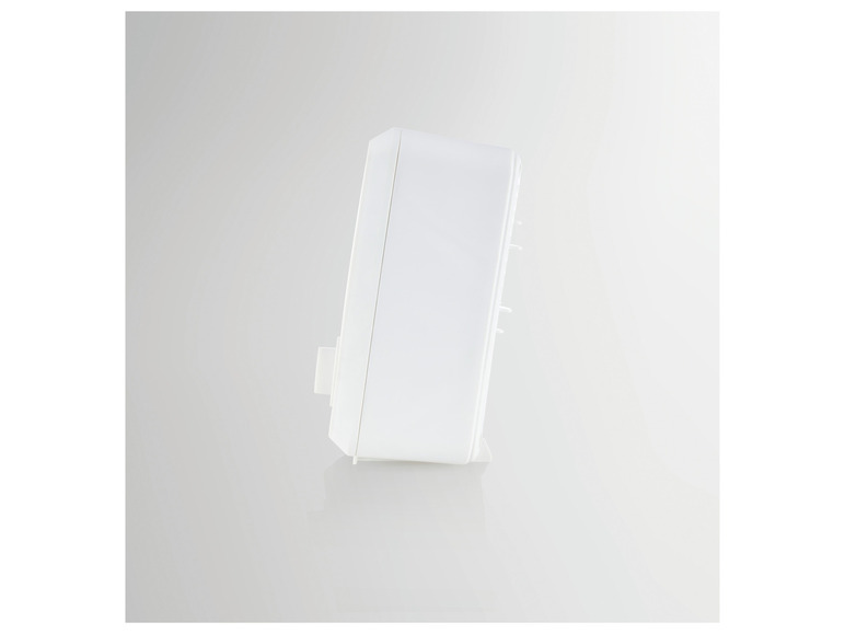Un réveil numérique blanc au design minimaliste.