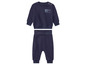 Un ensemble bébé bleu marine composé d'un sweat-shirt et d'un pantalon.