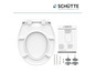 Een wit toiletbril met softclose van Schütte, met montage-instructies en bevestigingsmaterialen.