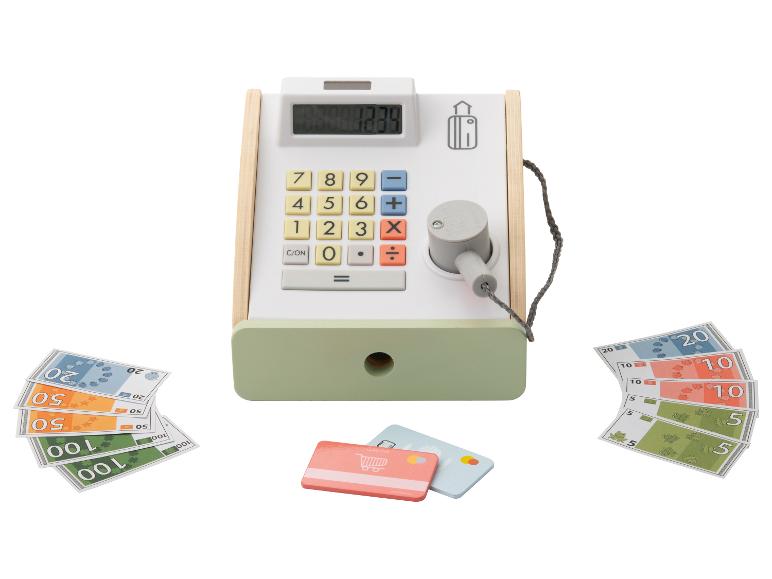 Caisse enregistreuse jouet avec argent, cartes de crédit et reçu.