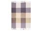 Plaid à carreaux beige, blanc et violet avec des franges.