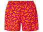 Korte broek met elastische tailleband, roze met oranje patroon.