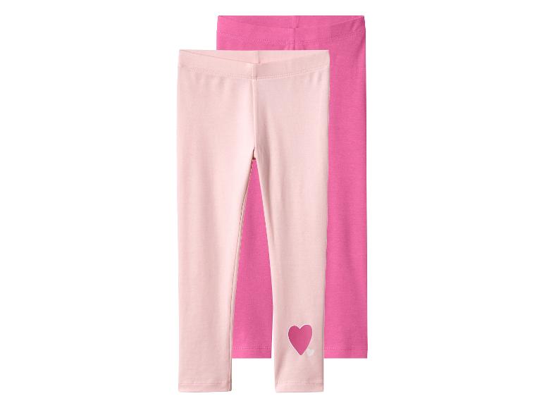 Deux leggings pour filles, un rose clair avec une découpe en forme de cœur et un rose foncé