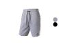Shorts de sport gris avec cordon de serrage noir et logo sur la jambe, également disponible en noir.