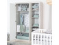 Une armoire blanche avec des vêtements de bébé et un lit bébé.