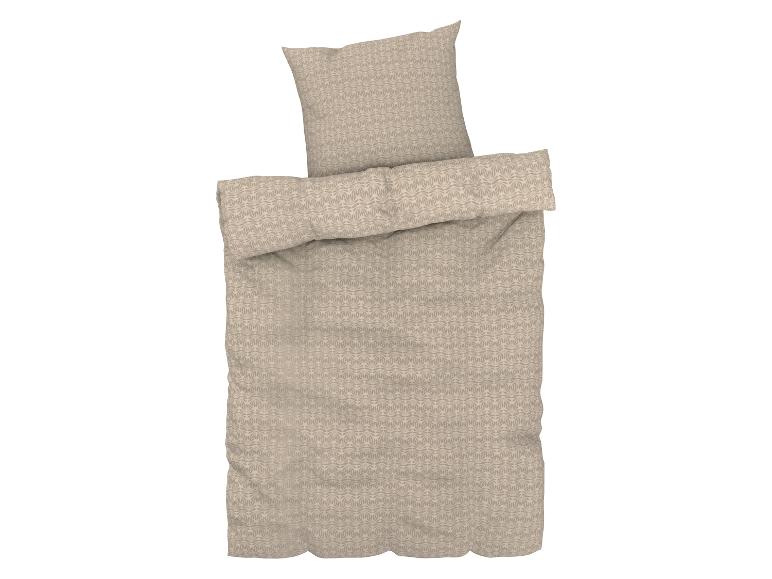 Beige dekbedovertrek met bloemenpatroon, inclusief kussenslopen.