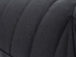 Close-up van een donkergrijze stoffen fauteuil.