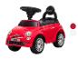 Voiture porteur rouge avec volant et siège noirs, dotée de roues chromées.