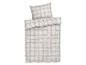 Parure de lit à carreaux beige et gris clair.