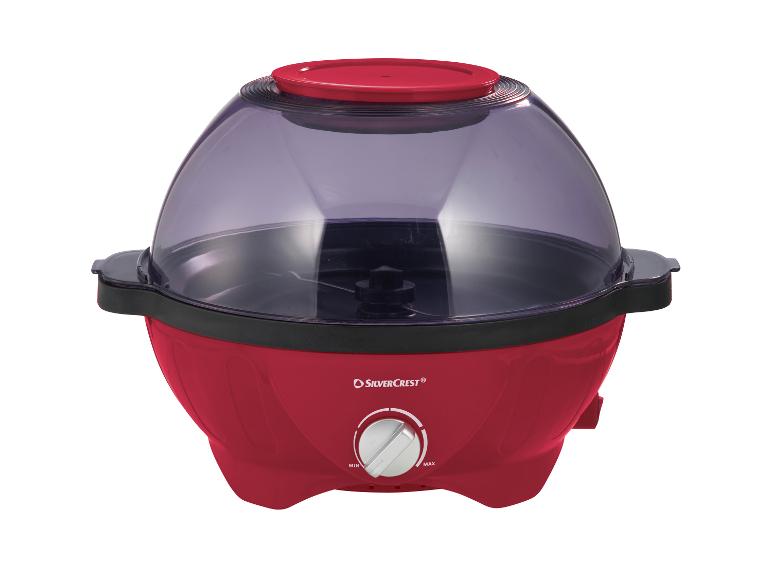 Machine à popcorn rouge avec couvercle transparent et contrôle de la température.