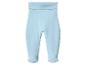 Pantalon de bébé bleu clair avec pieds intégrés et large ceinture.