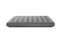 Matelas gonflable gris avec une surface capitonnée