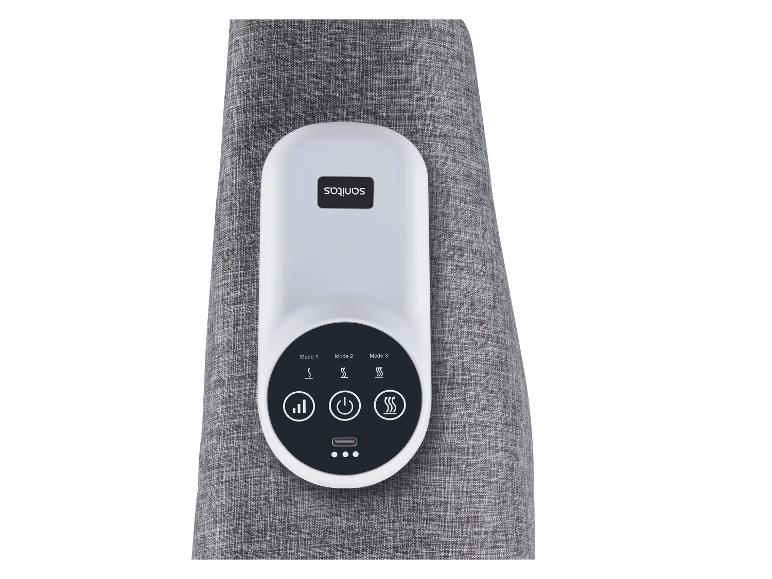 Contrôleur de massage avec écran numérique et boutons pour les modes et la chaleur, sur tissu gris.