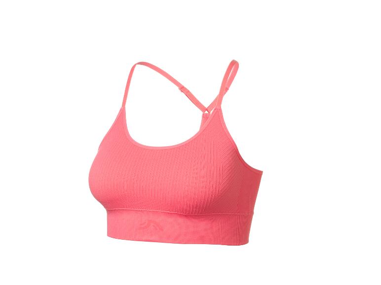 Roze geribbelde sportbeha met dunne bandjes.