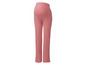Pantalon de grossesse rose à côtes.