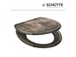 Een toiletbril met een houten patroon van Schütte.