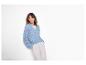 Dames blauw opengewerkt vest en witte broek