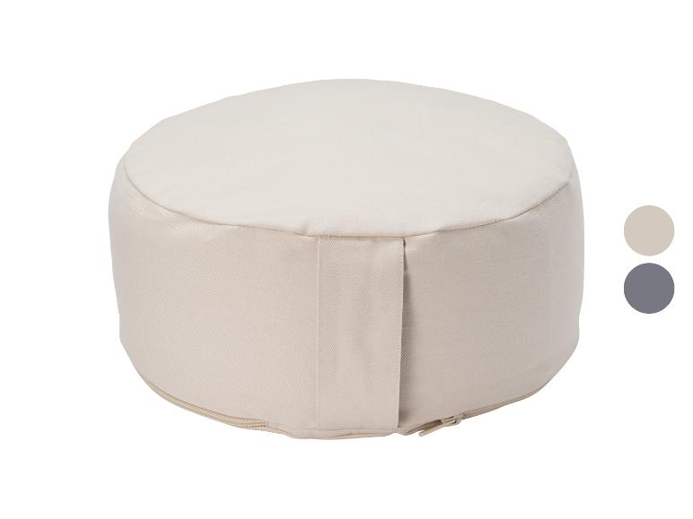 Coussin de méditation beige avec fermeture éclair, avec une palette de couleurs à côté.