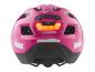 Roze kinderfietshelm met brandend achterlicht