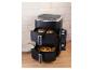 Dubbele airfryer met kip en friet, toont digitale bediening en kookmodi.