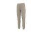 Pantalon de jogging beige avec taille élastique et chevilles resserrées.
