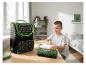 Sac à dos et trousse à motifs de jeu vidéo, avec un enfant dessinant à un bureau.
