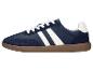 Donkerblauwe en witte sneakers met een bruine zool