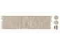 Een beige vloerkleed met franjes